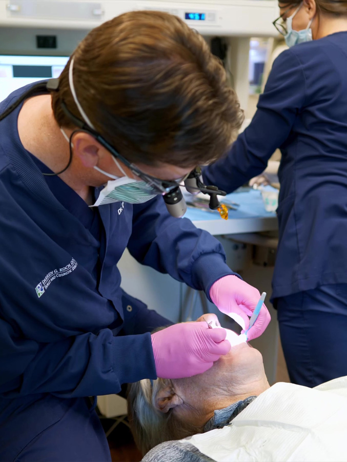 Dentist in Cary performing a dental exam on a patient