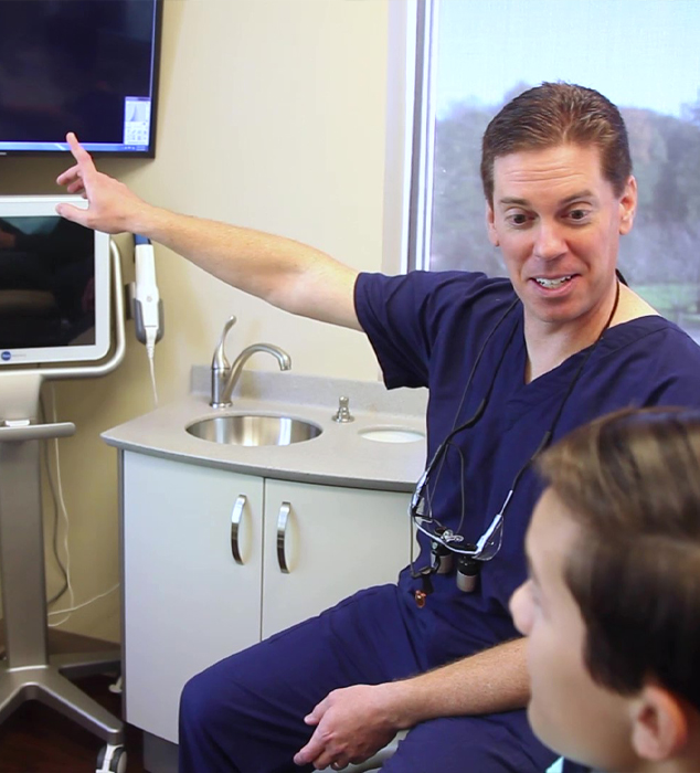 Cary dentist showing a patient their dental x rays