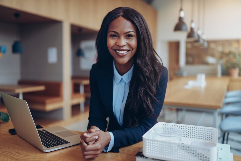 Woman smiling in professional workspace