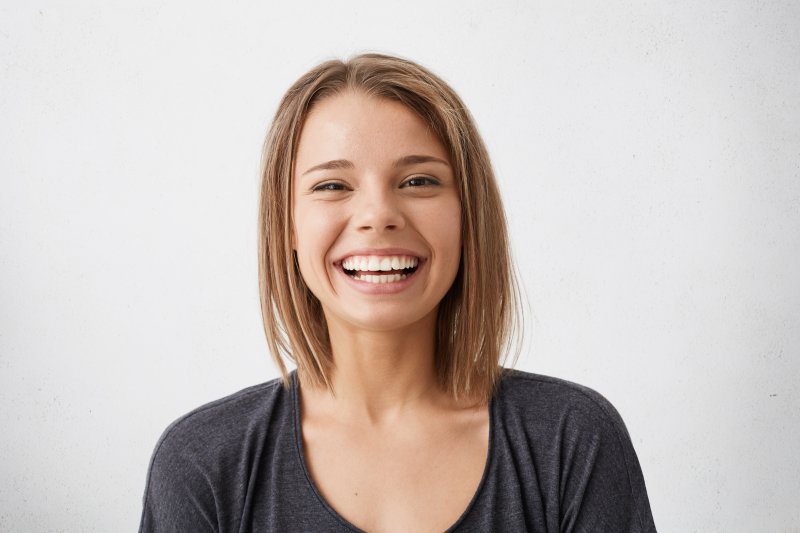 person with nice smile thanks to cosmetic dentistry