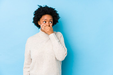 person with a dental emergency covering their mouth