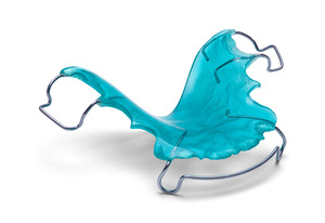 Close-up of a light blue orthodontic retainer
