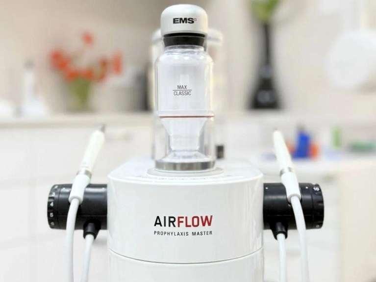 close up of guided bio film therapy technology | dentist in cary nc