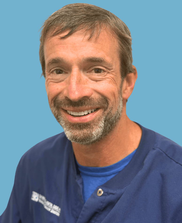 headshot of christopher hartung | cary dentist